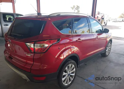 2017 Ford Escape Titanium z USA, uszkodzony, nr VIN 1FMCU0J98HUD29348